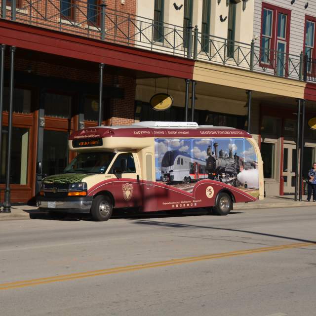 grapevine visitors shuttle parked on main street