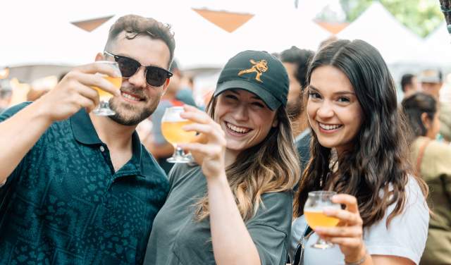 Group of friends cheersing with craft brew