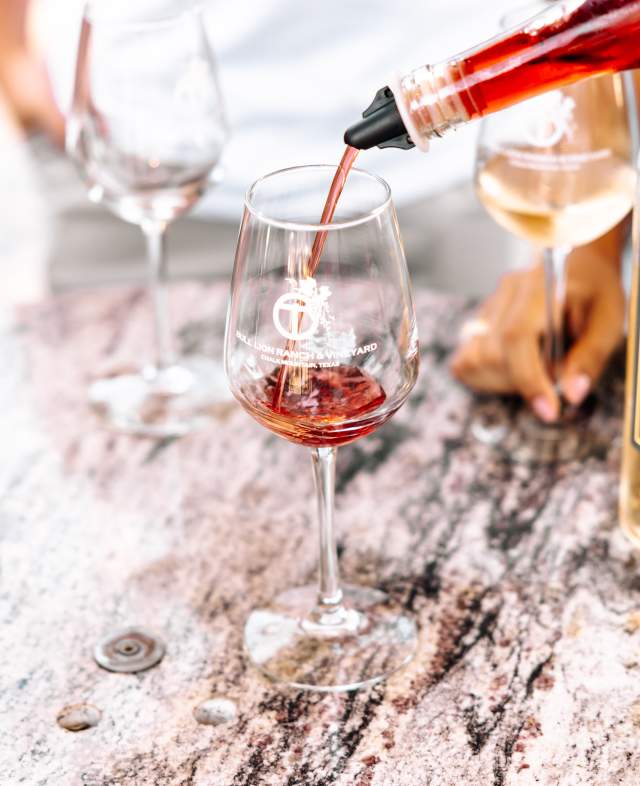 wine being poured into a glass